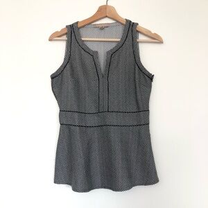 Spotted Black White Peplum Sleeveless Top